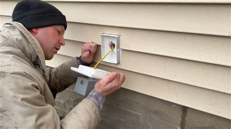 metal outlet box on siding|vinyl siding exterior outlet installation.